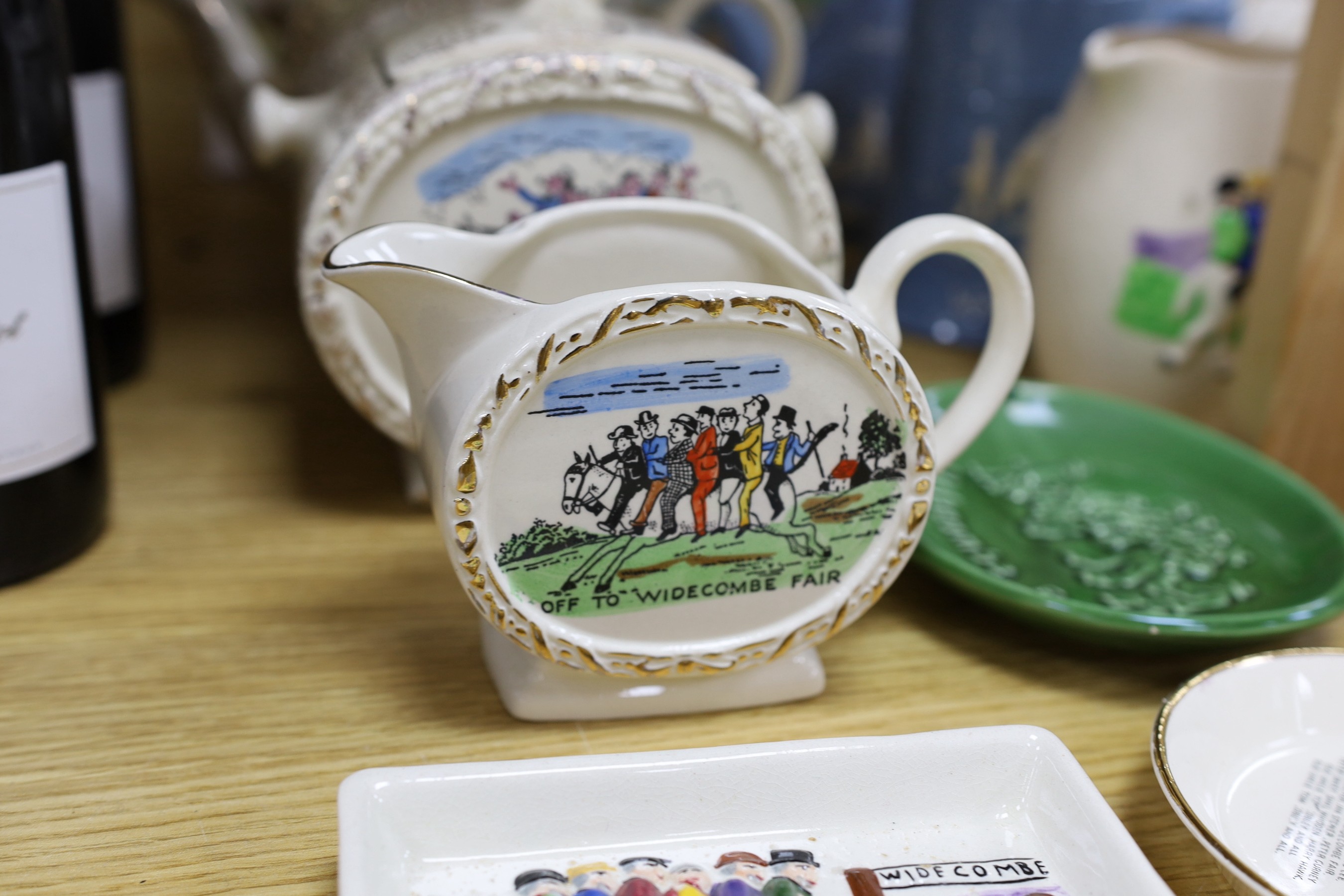 A quantity of novelty items relating to Widecombe Fair, to include jugs, teapots etc.